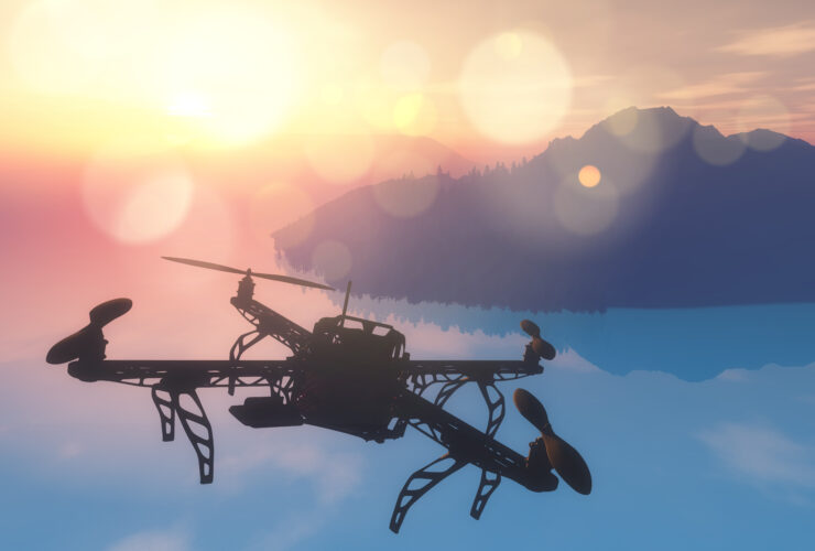 Drone Surveying Ocean Depth at Sunset With UAV Tech